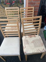 Dining Table and four chairs in good condition 