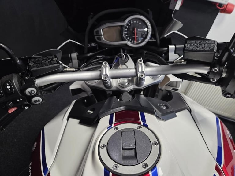 2013 Triumph Tiger Explorer 1215 in white with luggage.