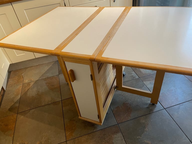 Space saving table with 3 folding chairs