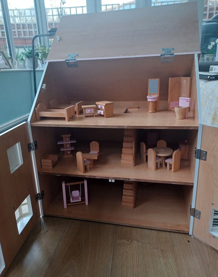 Pink and white wooden Dolls House 