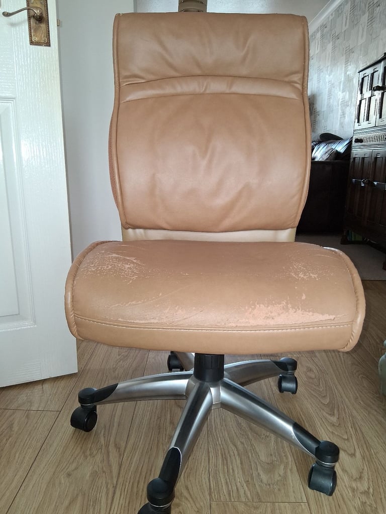 Light brown leather office chair with wheels