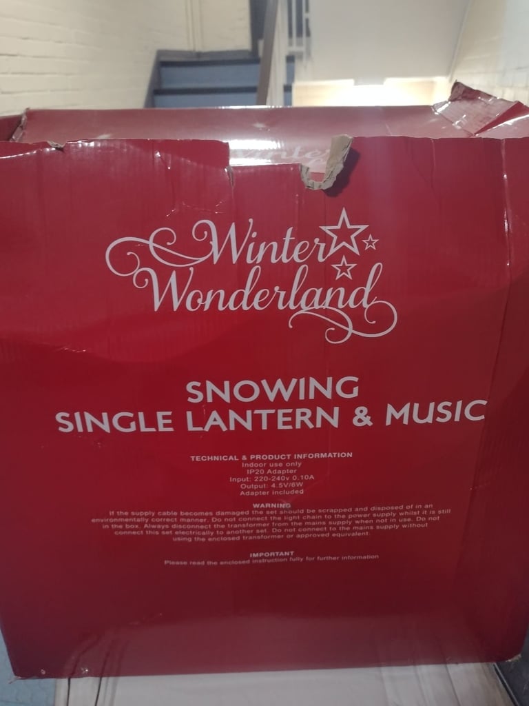 Snowing and musical single lantern £70