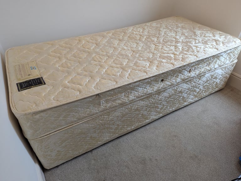 Single divan bed with soft and firm reversible mattress options 
