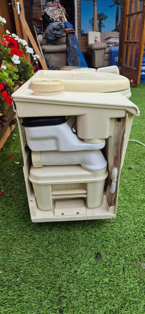 Whole complete toilet unit for camper conversion.