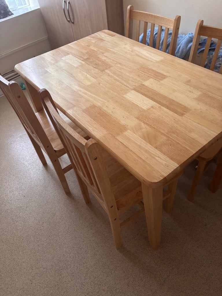 image for Very good condition dining table set with chairs and table ! Very strong wooden table!