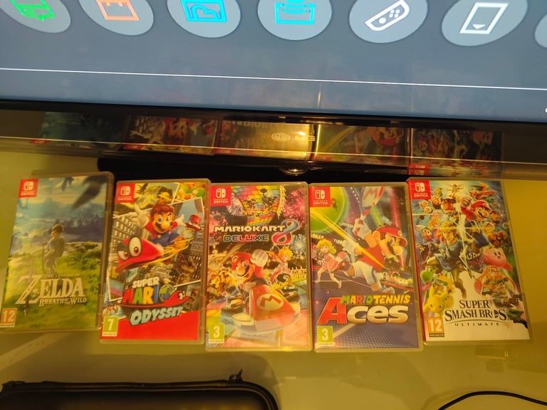 Nintendo Switch 32GB with Games and Pro Controller - Very Good Condition