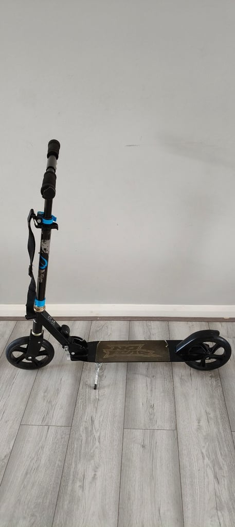 No Fear foldable scooter with holding strap over 7 years