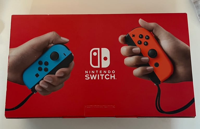 Boxed Switch 1 Neon Red & Blue with Carrier Case