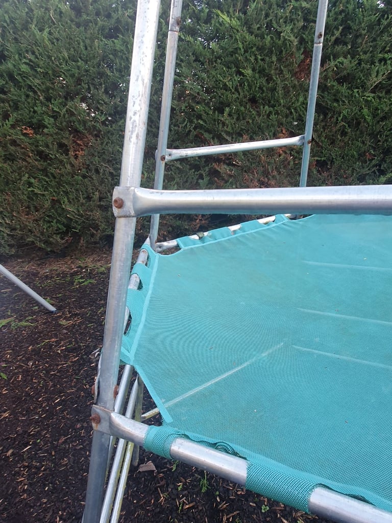 Climbing frame with slide