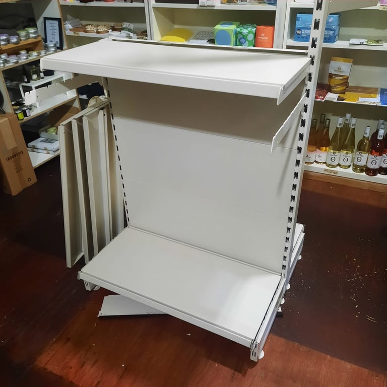 Metal shelving units with lots of adjustable shelves, possible counter