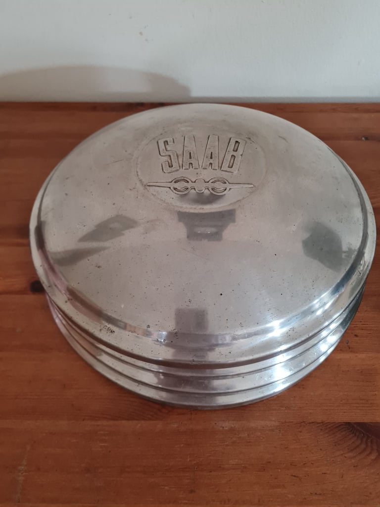image for Saab hub caps and clocks 