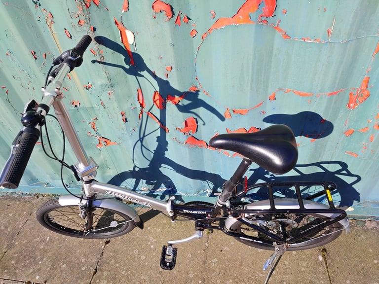 Apollo Transition folding bikes with bags