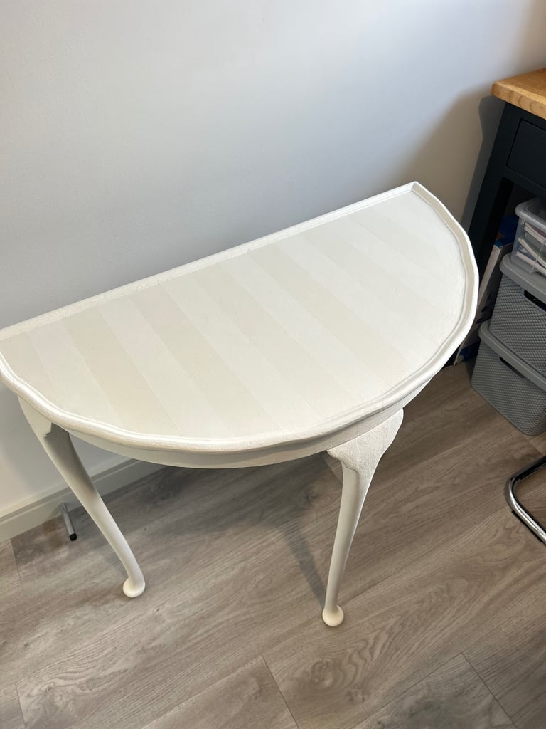 Elegant refinished hall table with ghost stripes