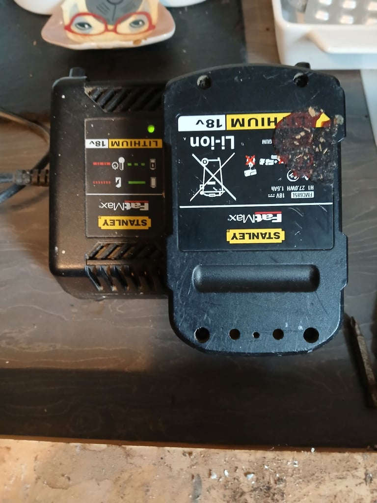 Stanley fatmax drill with 2 batteries and a charger 