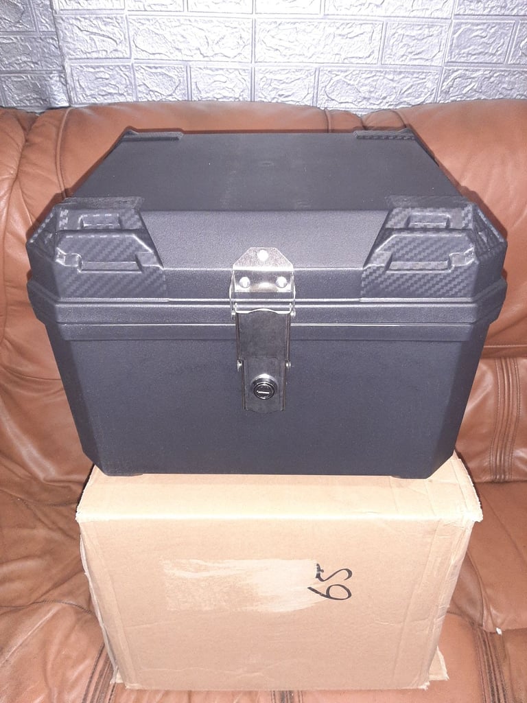 Brand new 45 litre  top box complete  with all hardware and 2 keys never fitted 