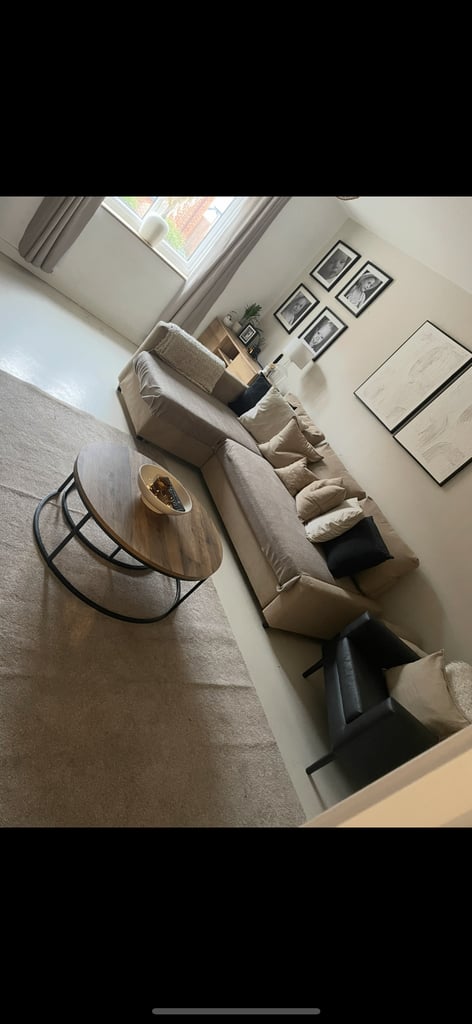 IKEA beige sofa with hidden storage and sofa bed 