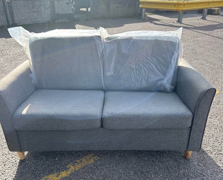 Small grey 2-seater sofa with pine legs