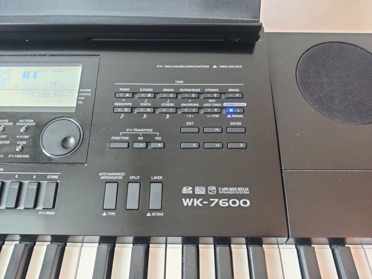 Casio WK-7600 76 Key Piano Style Portable Keyboard with Metal Stand and Pedal