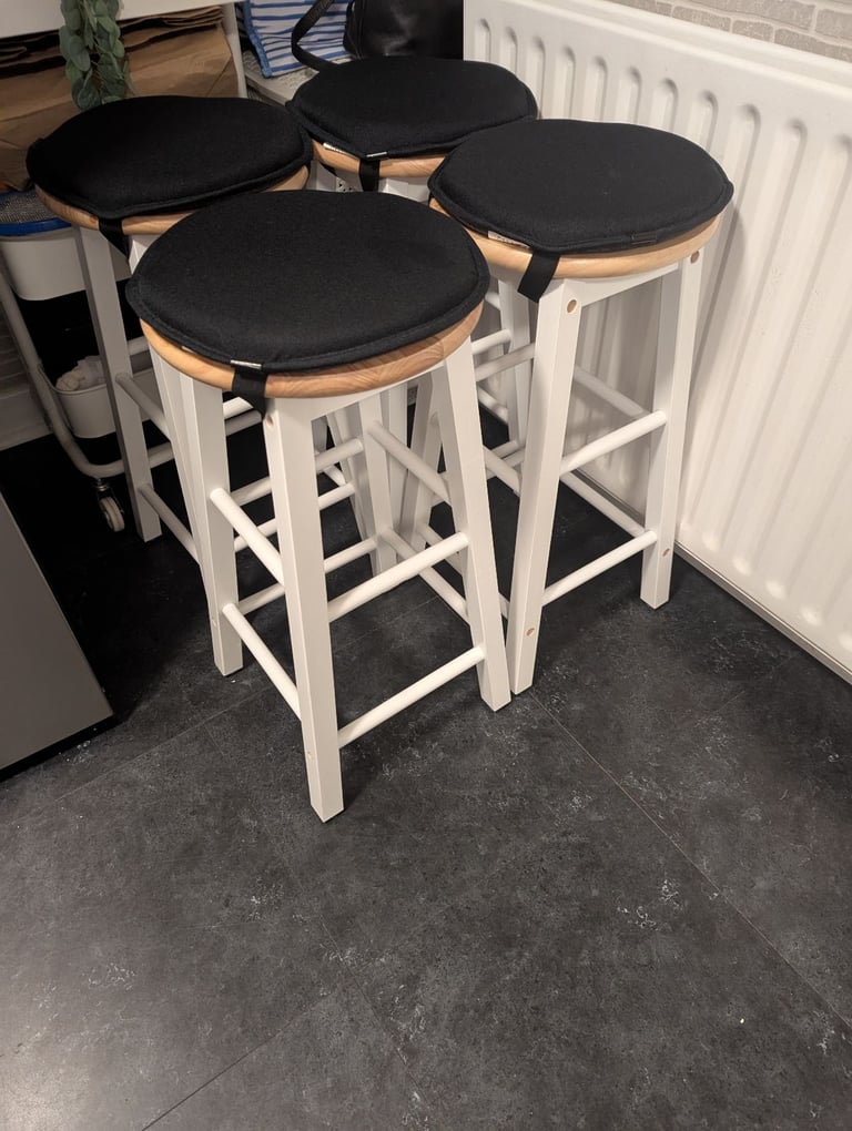 Habitat 4 as new wooden stools with clip of seatpads 