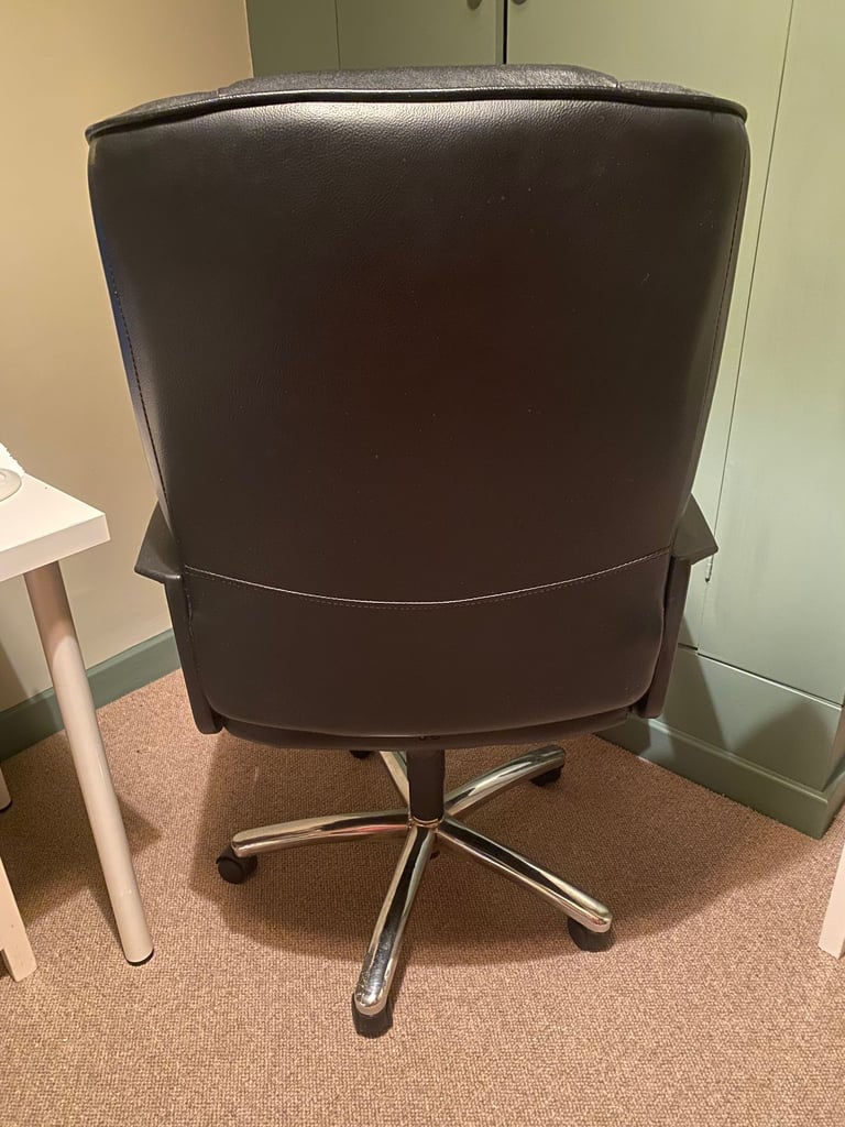 Black faux leather office chair with stainless steel legs bedroom study work from home