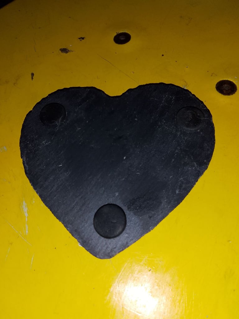 The Slate company coasters and candle stand