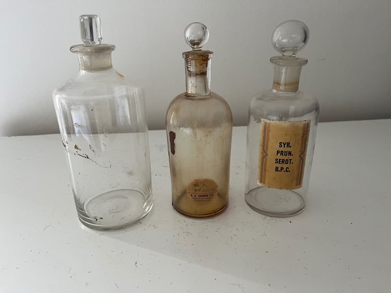 image for Three Antique Apothecary Chemist Glass Bottles/ one damaged bottle