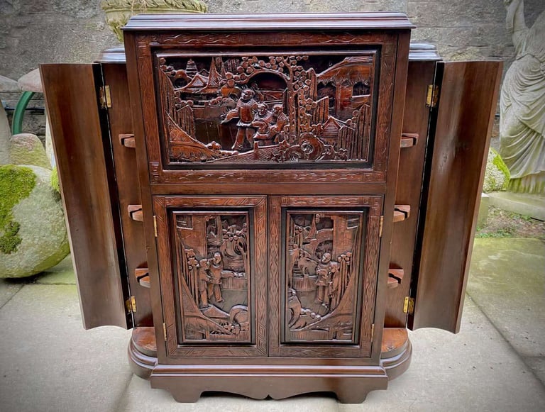 20th century Chinese heavily carved camphor wood cocktail bar cabinet