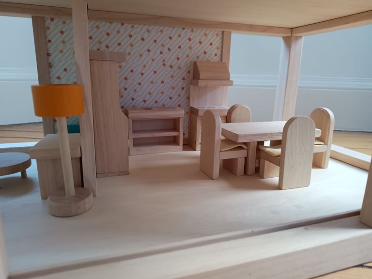Plan toys wooden dolls house complete with furniture set and dolls, like new condition £120 ono