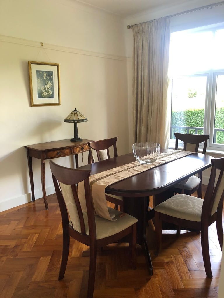 WOODEN OVAL DINING TABLE AND 4 CHAIRS