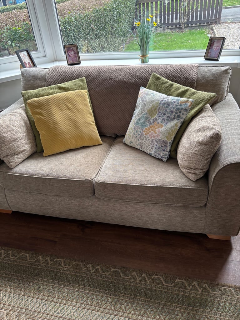 Beige sofa bed.