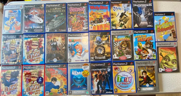 PlayStation 2 Silver Bundle 23 Games 3 Controller Memory Card + Buzz controller 