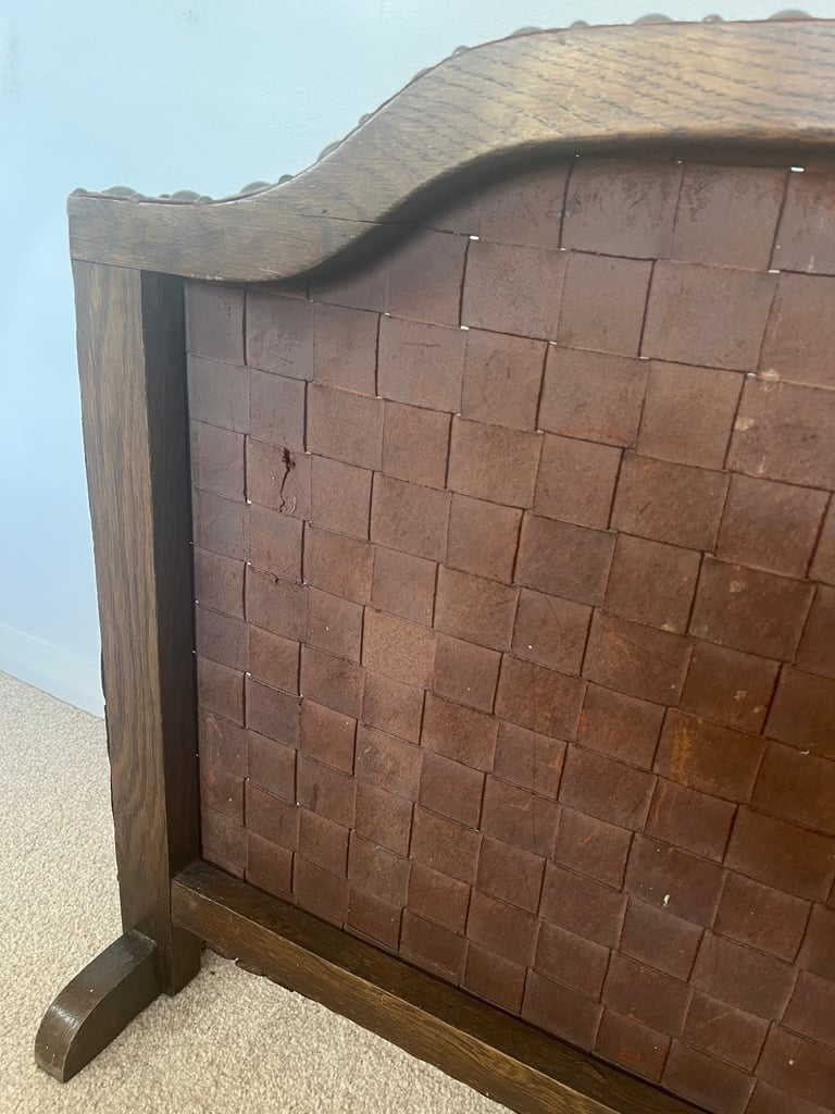 Arts and Crafts Oak and Woven Studded Leather Fire Screen. 