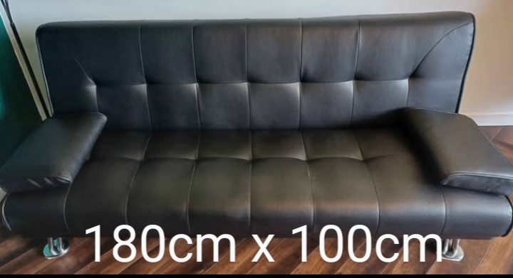 image for Leather sofa bed like new (can deliver)