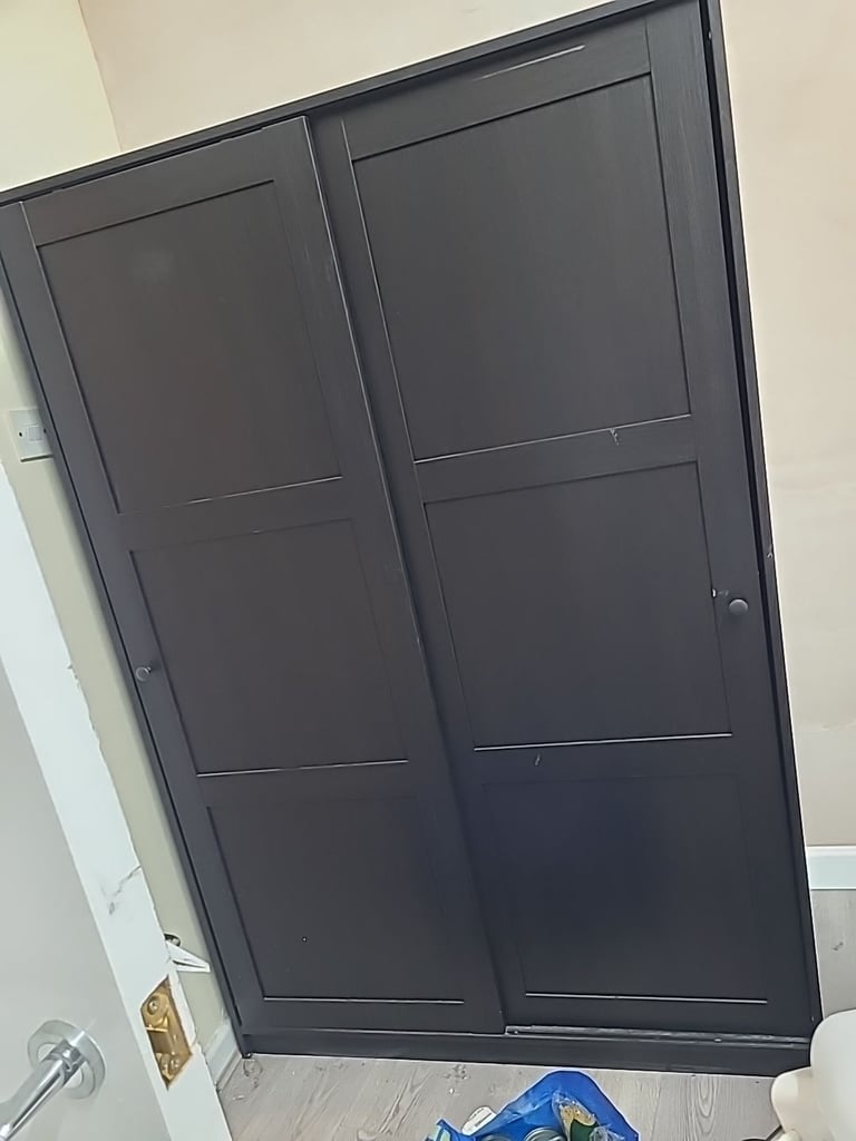 image for black/brown wooden wardrobe with sliding doors (rails and a shelf on each side)