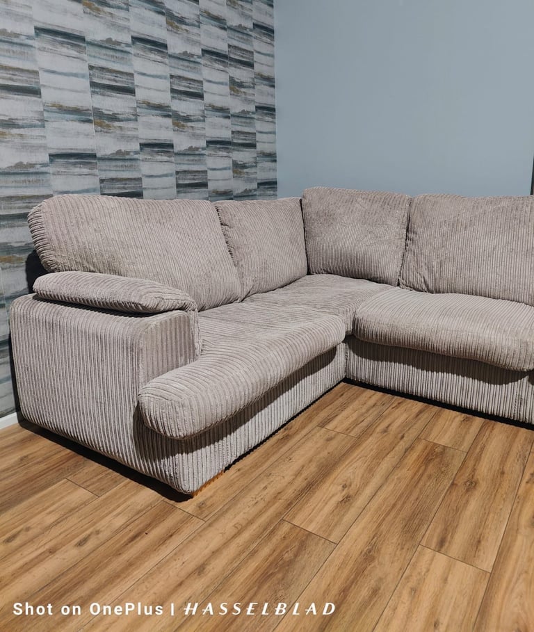 Large beige DFS Corner Sofa Bed  with footstool + free delivery