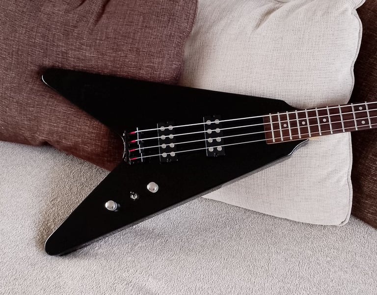 Iconic Flying V Bass Guitar, Plays And Sounds Really Well, Good Condition.