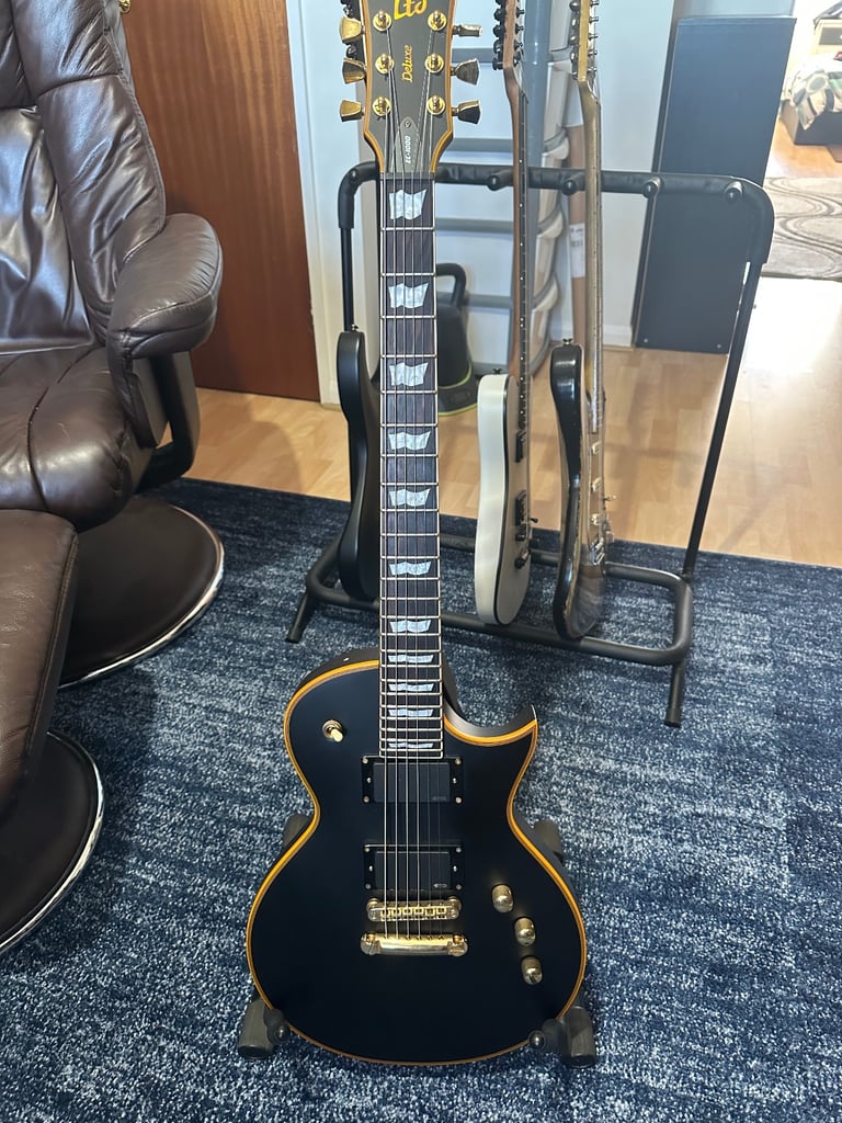 Esp Ltd ec1000 deluxe guitar in satin black