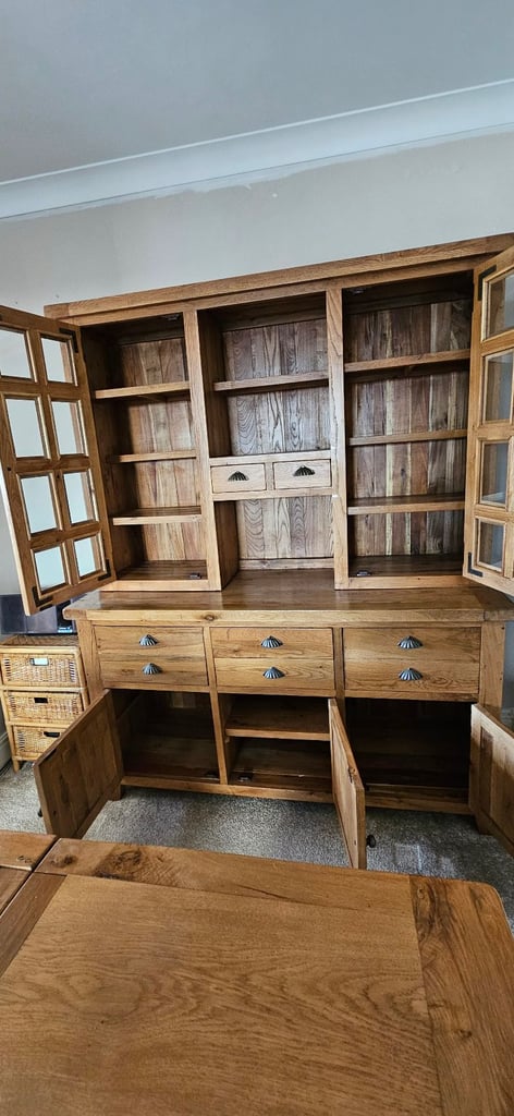 Oak dining table with six chairs and oak dresser