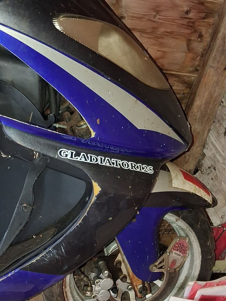 Motorcycle moped  125 parts or fix up 