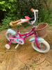 Child’s bicycle (Elswick) with stabilisers, bell and basket