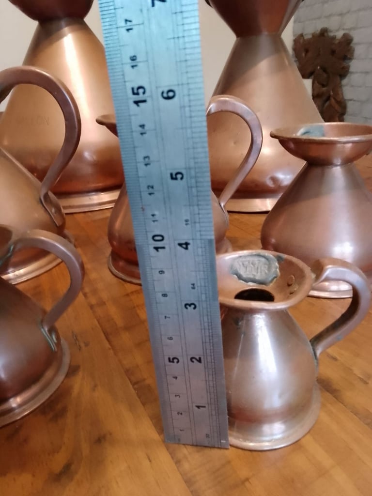Vintage copper brass measure jug collection