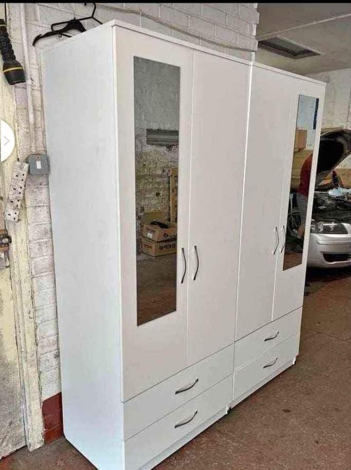 Modern Bedroom Furniture. Bedroom Suit Includes Bedside Tables, Chest of Drawers and Wardrobes