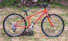 Islabike Beinn 24 red in excellent condition.  Age 7+.  Can courier.  Isla bike