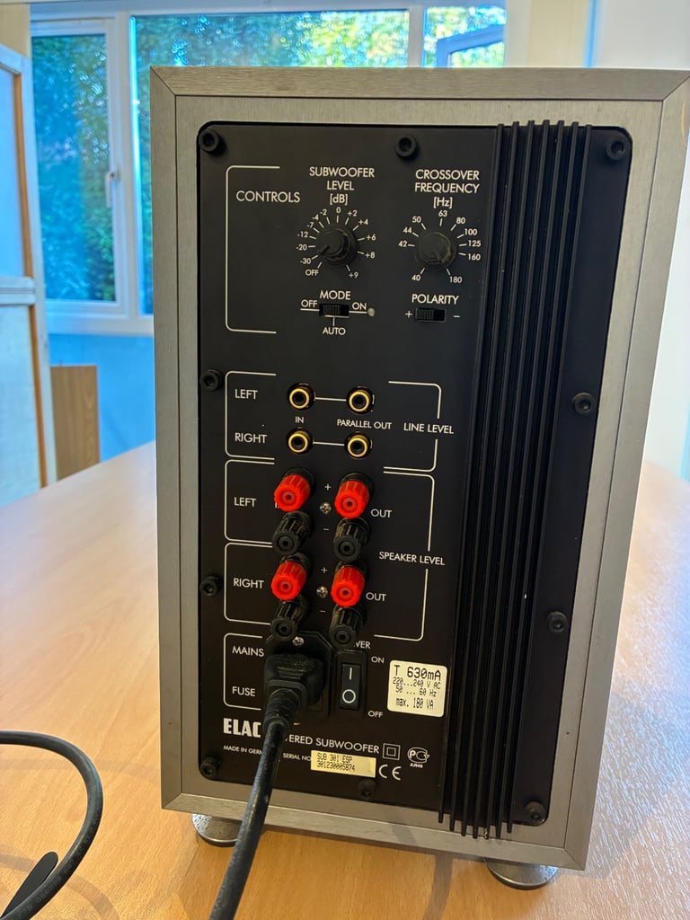 ELAC 301 subwoofer and 5 surround sound speakers