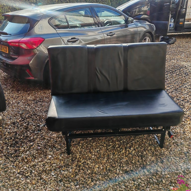 Rock and roll bed for camper van