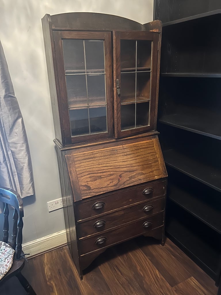 Antique brown writing desk and cupboard