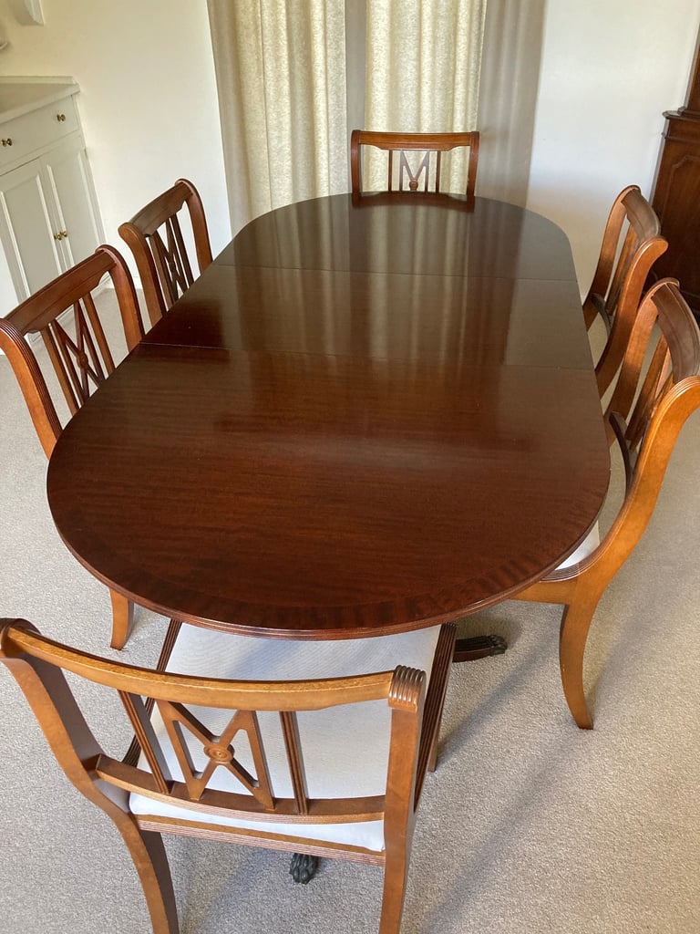 Mahogany extendable dining table with 6 chairs and mahogany sideboard