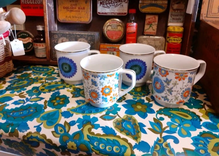 Unused retro mugs. Has gold coloured edging. Made in Poland. 