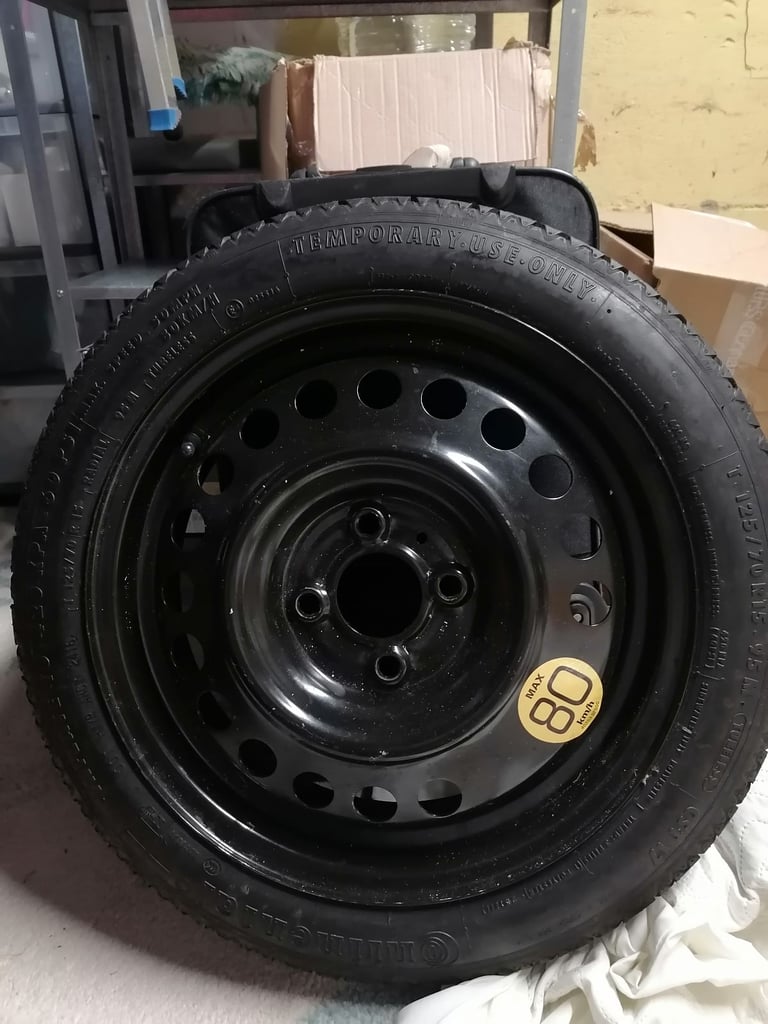 New continental space saver spare wheel.