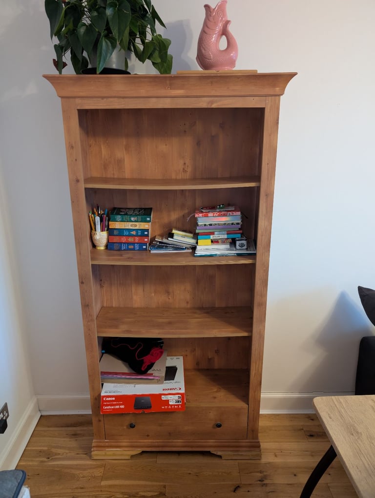 Reddish wood bookcase